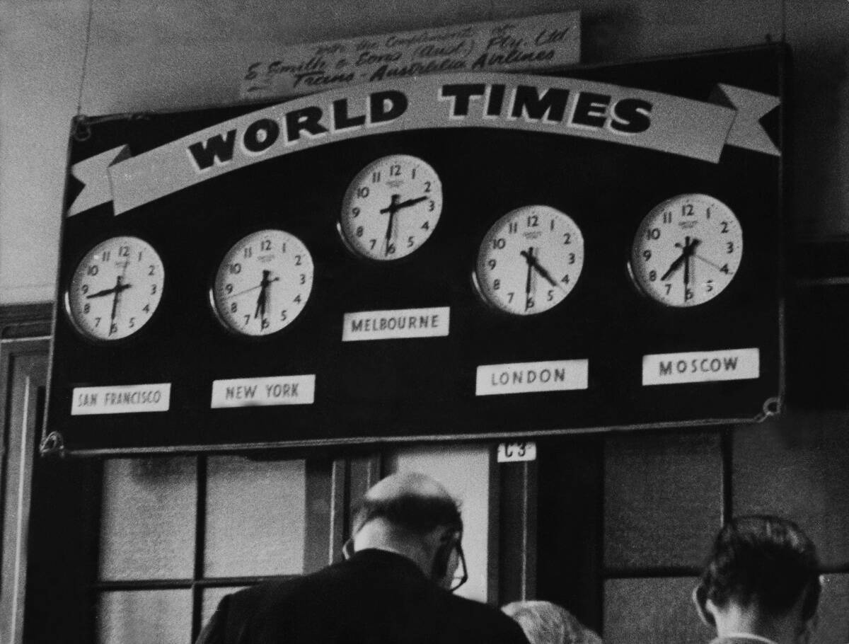 Clocks Showing The Local Hour On The Globe In Melbourne On December 3Rd 1956.