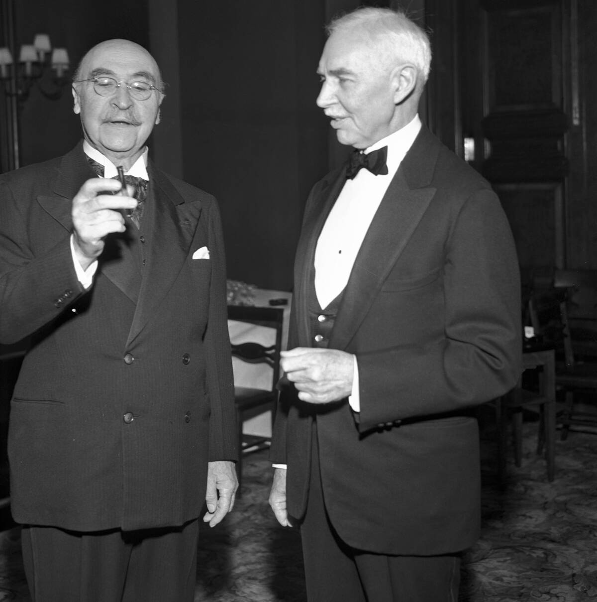 Dr. Leo H. Baekeland Showing First Tube of Bakelite