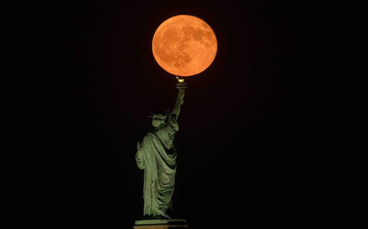 Full Sturgeon Moon Rises in New York City