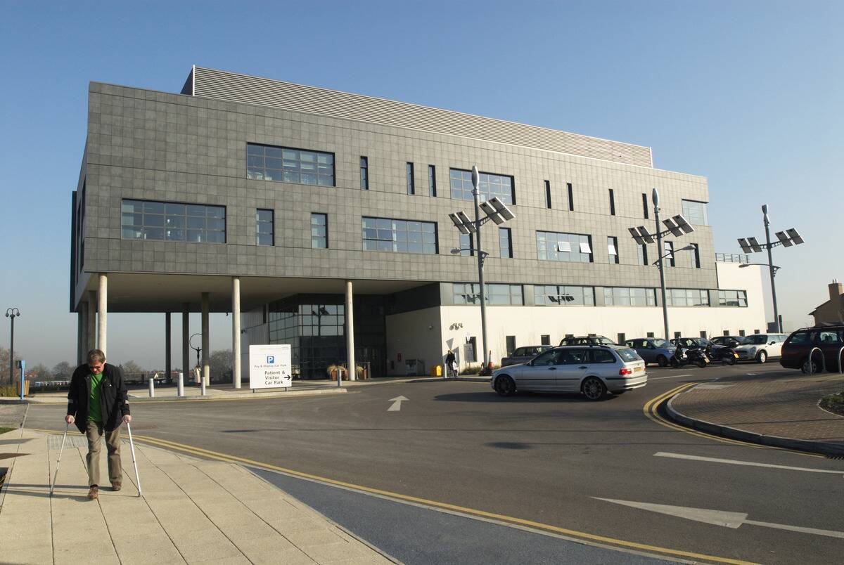 Gateway Surgical Centre with solar powered lighting in car park, Newham, London, UK