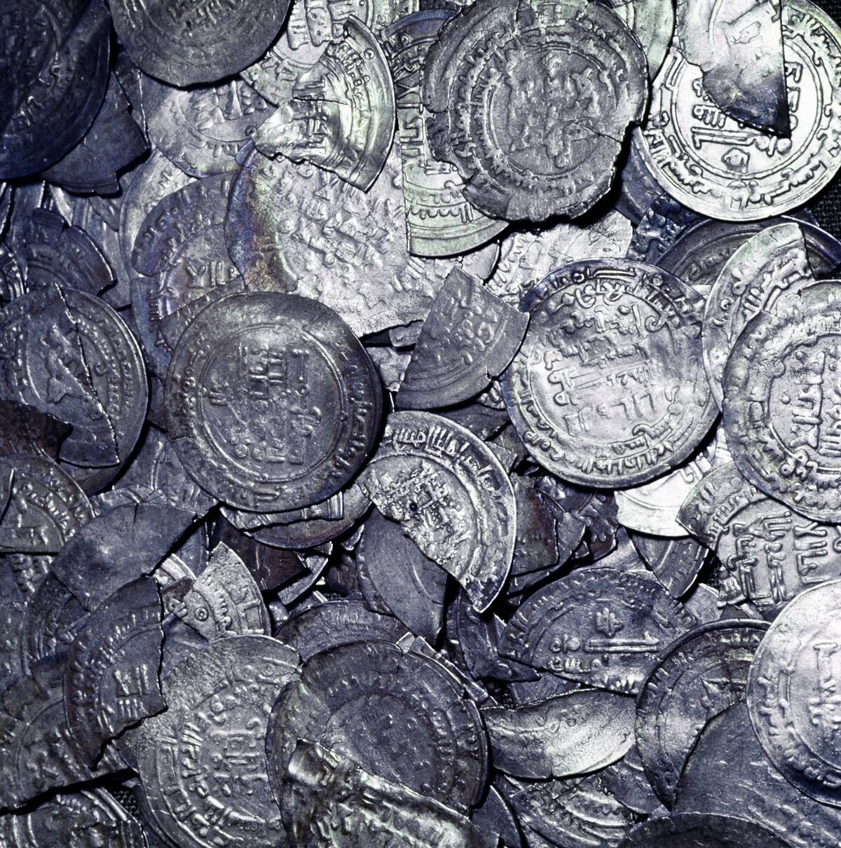 Hoard of silver & Arab coins from a Viking grave, Sweden, 10th century.