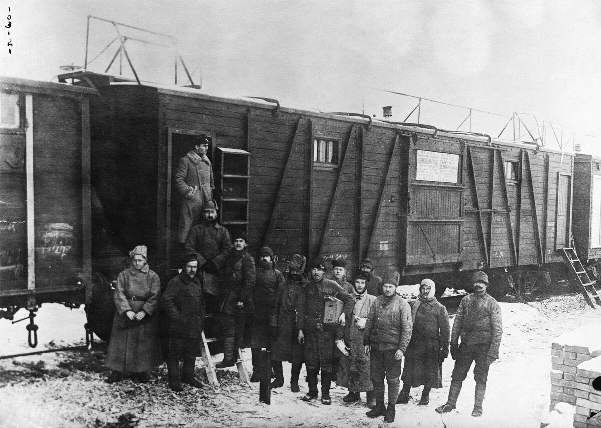 Soldiers Cleaning Clothes In Train Car