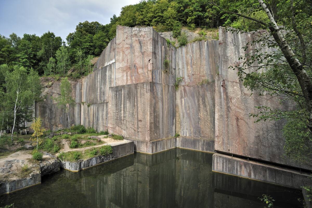The abandoned red marble quarry Carriere de Beauchateau at Senzeilles in the Belgian Ardennes, Belgium