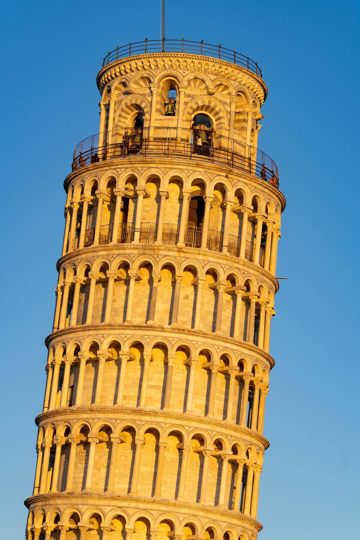Tourists on the observation platform of the Leaning Tower of Pisa. Pisa, Italy
