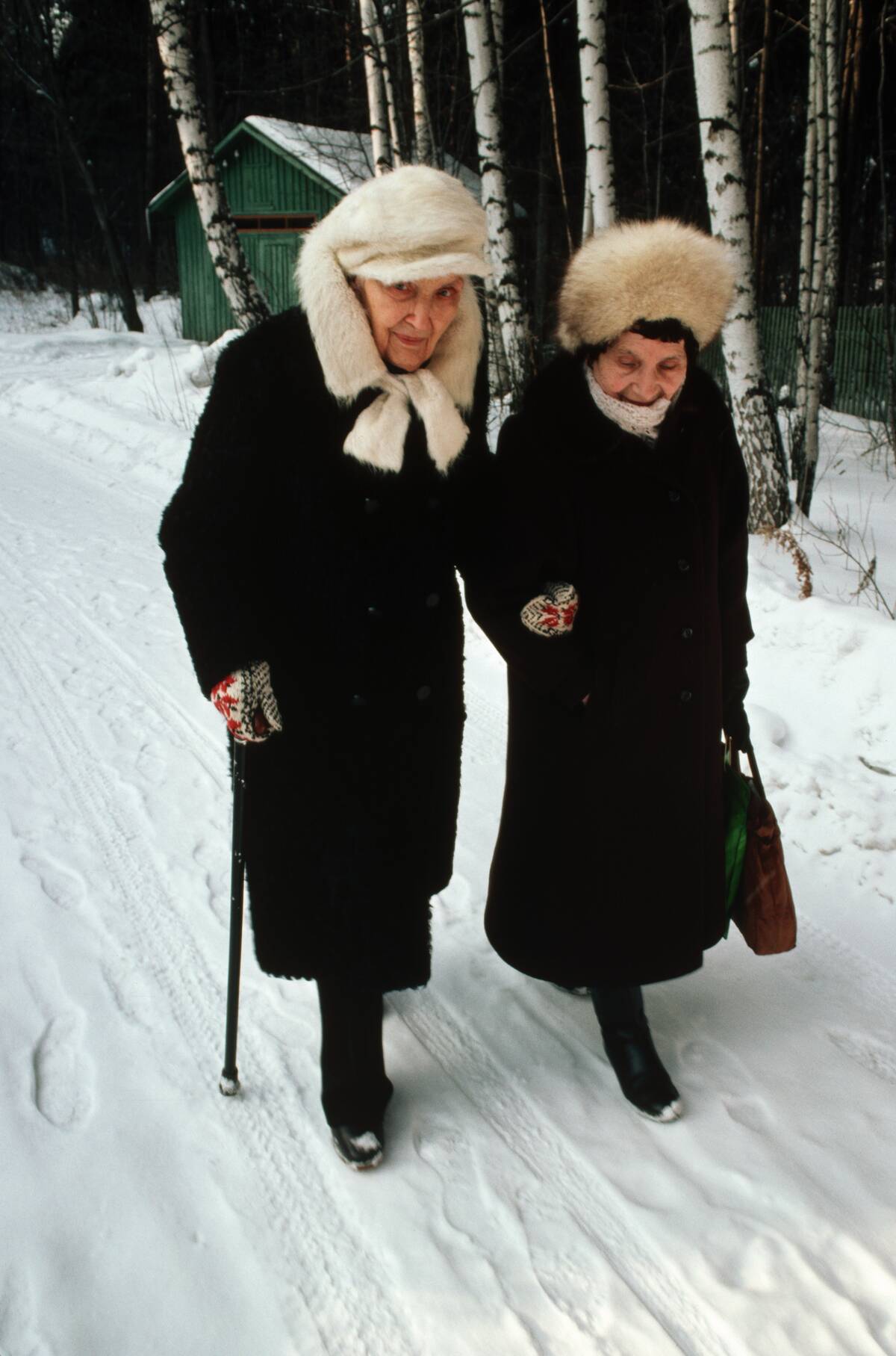 Elderly Women Walking in the Snow