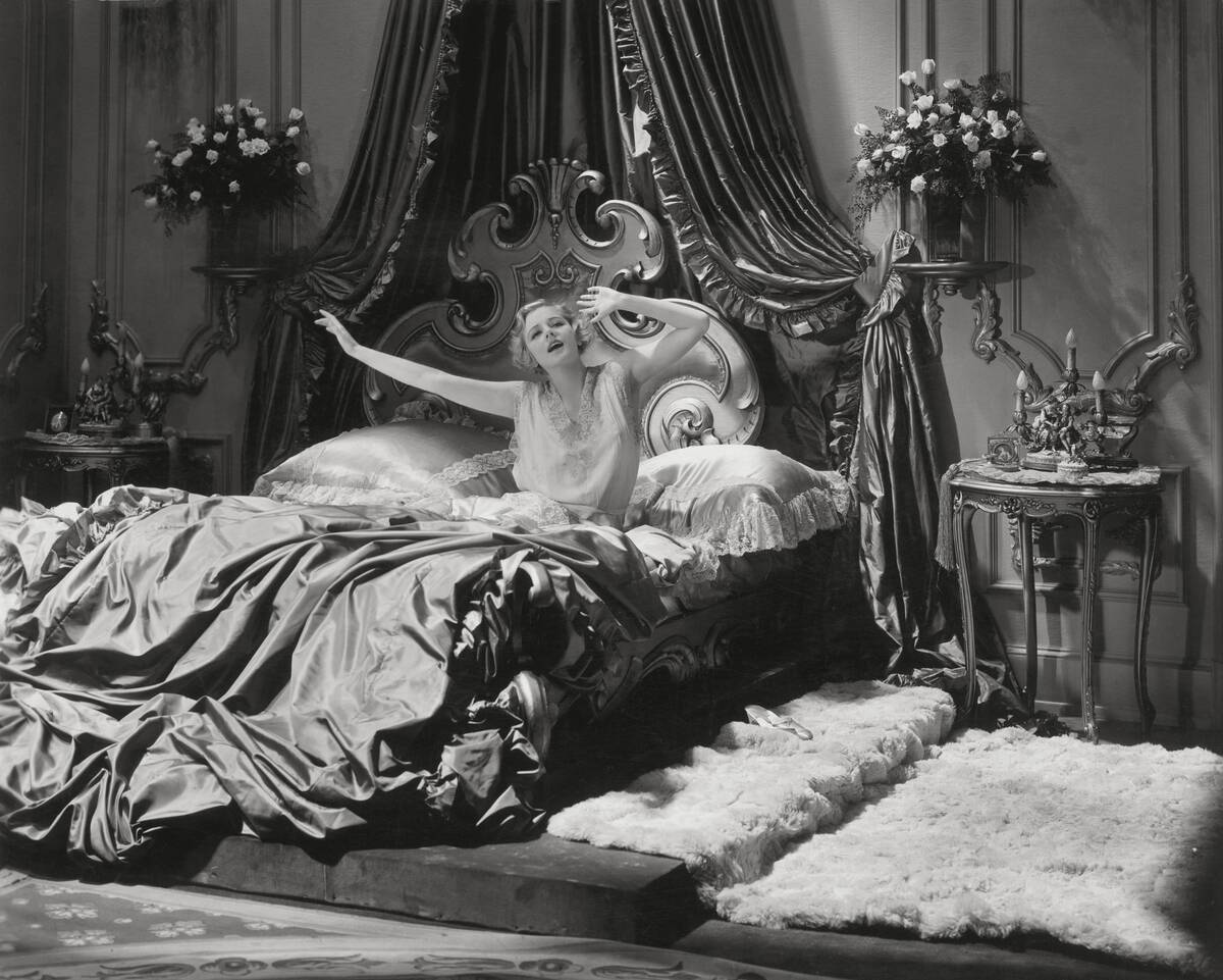 Evelyn Laye Stretching in Bed