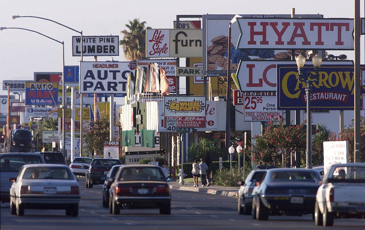 FRESNO01-C-16AUG99-MN-MAC The City of Fresno. Looking down Blackstone Avenue in the middle of the city, with dozens of business signs that line the street. by Michael Macor/The Chronicle