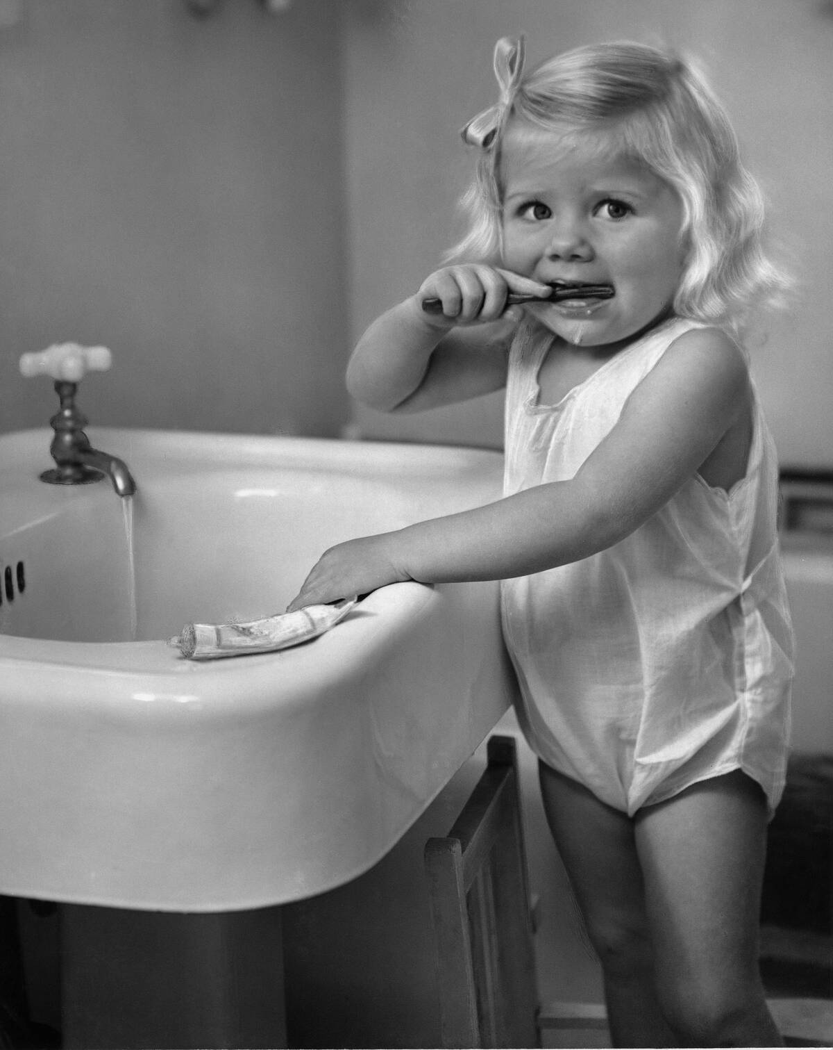 Girl Brushing Teeth