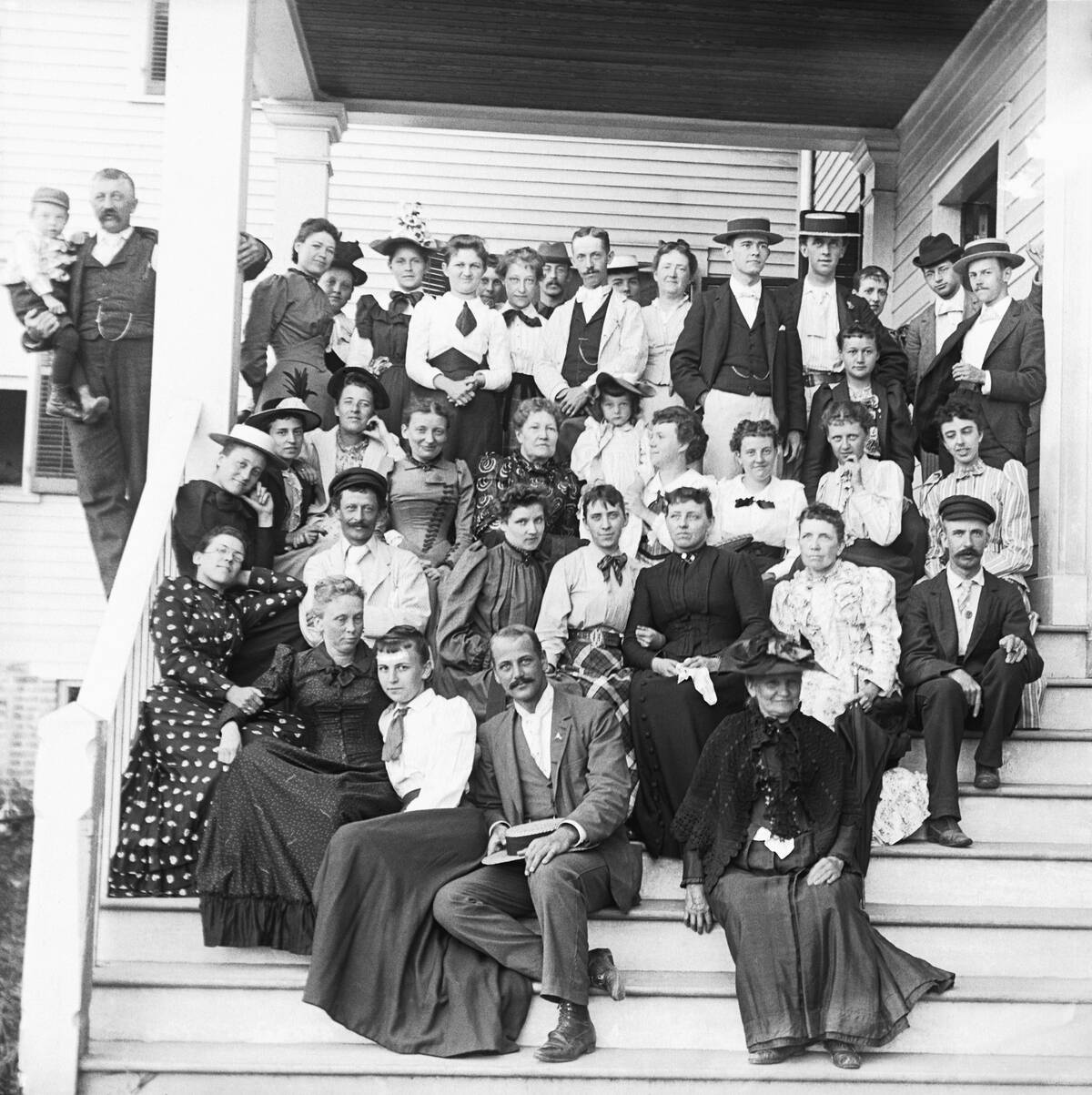 Large Family Reunion on Farmhouse Steps