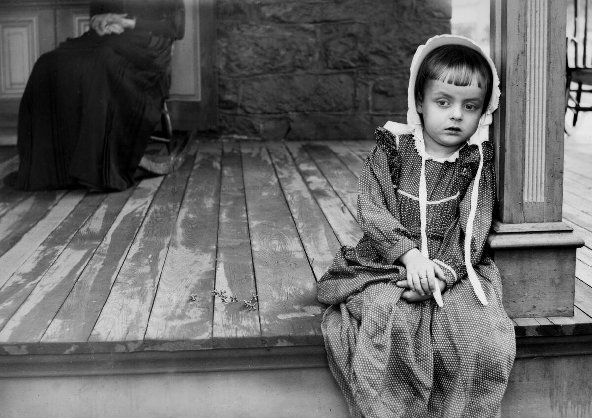 Little girl on a porch, ca. 1903