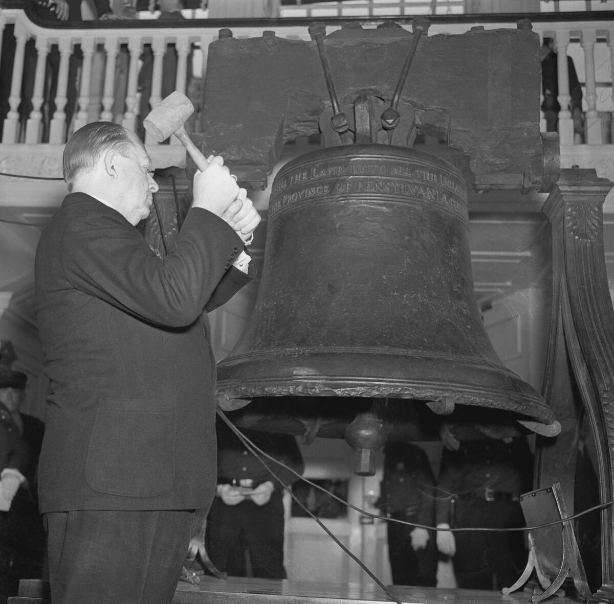 Mayor S. Davis Wilson of Philadelphia Striking Liberty Bell