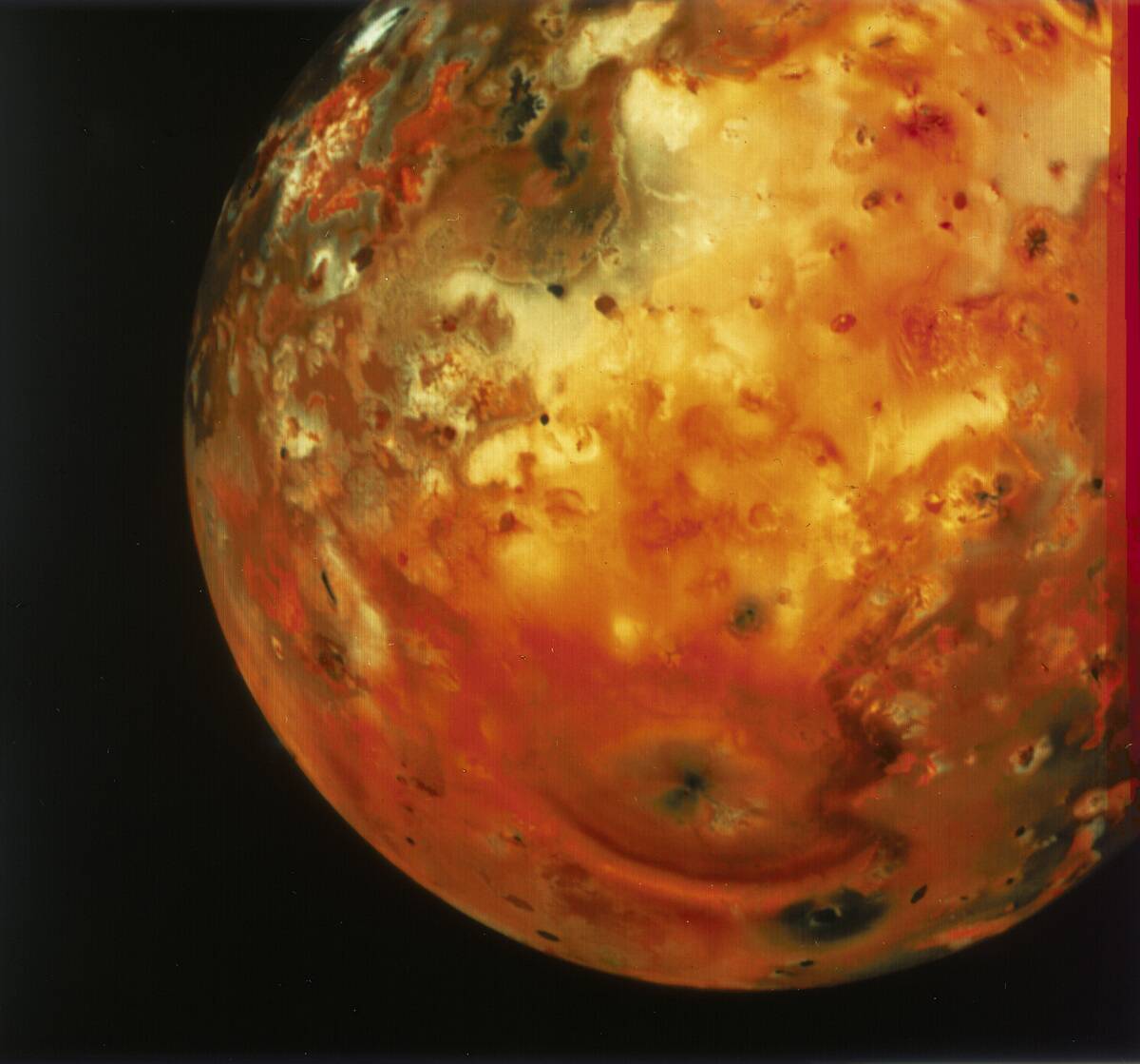 Nearly full view of Io, one of the moons of Jupiter, 1979.
