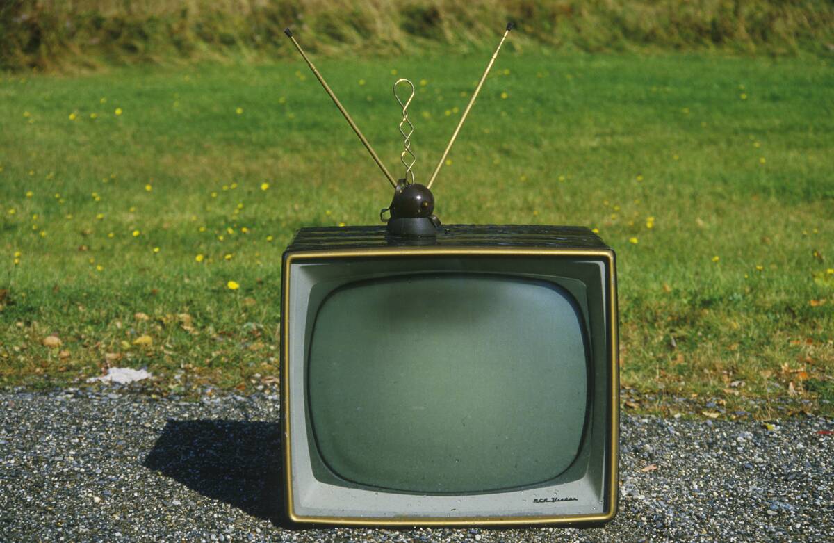 Old retro television set with rabbit ears antennae, New England