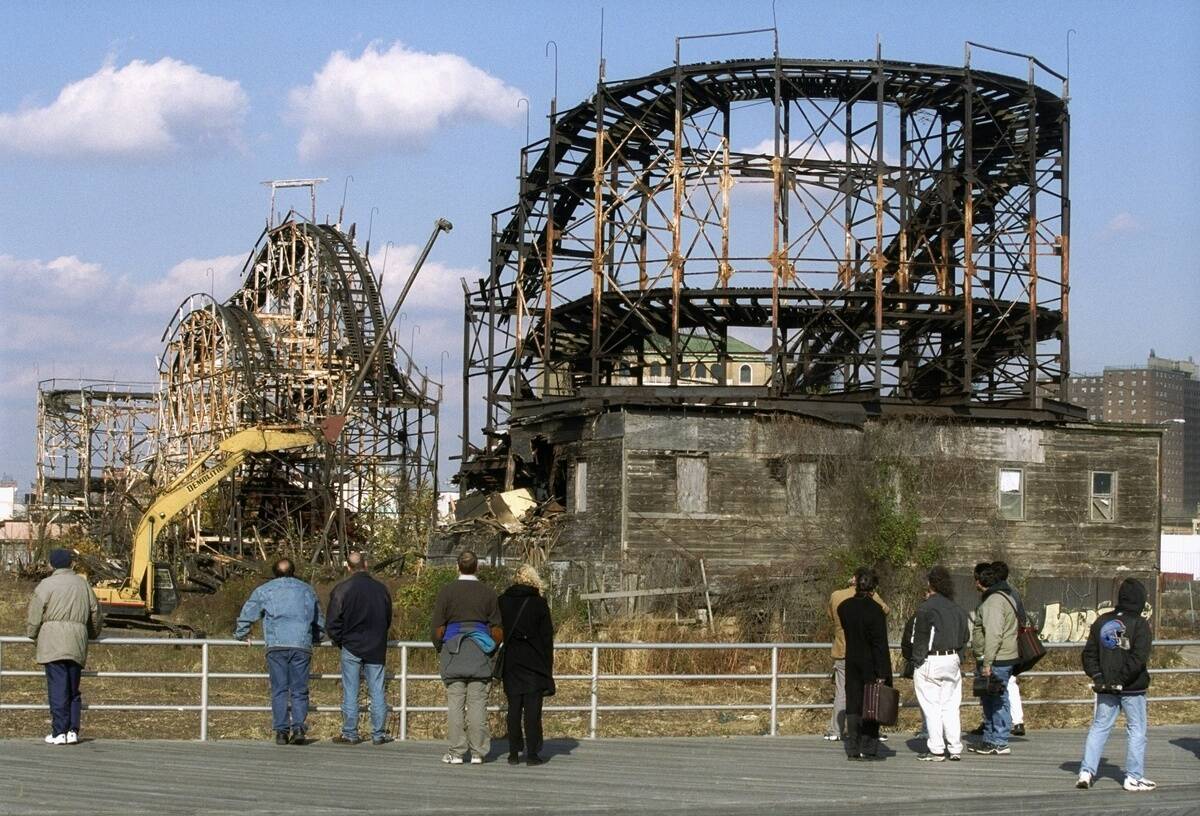 Onlookers watch from the boardwalk as the old Thunderbolt ro