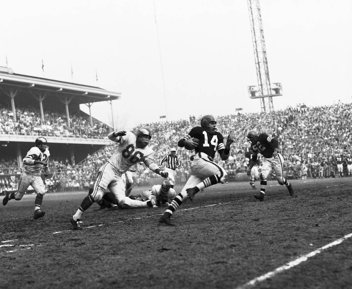 Quarterback Otto Graham Running with Football During Game