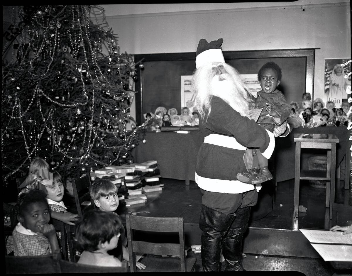 Santa Holding a Crying Child