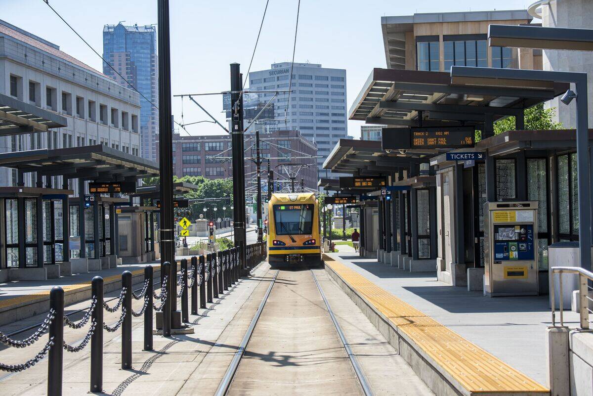 St. Paul, Minnesota, Light rain train going through a station and heading to downtown.