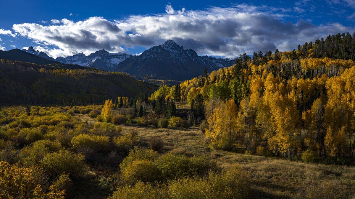 sunrise over San Juan Mountains off Dallas Creek Road
