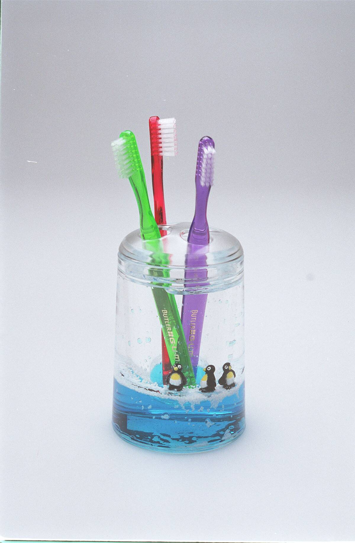 Toothbrush holders. NOTE THAT THE HOLES IN THE SMALLER HOLDER WERE NOT BIG ENOUGH TO ACCOMODATE THES