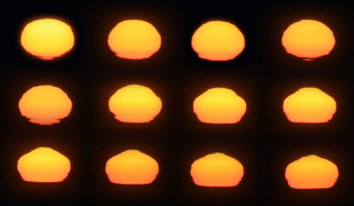 Sunset_mirage,sunspot_mirage,_green_rim_and_green_flash_9-27-10