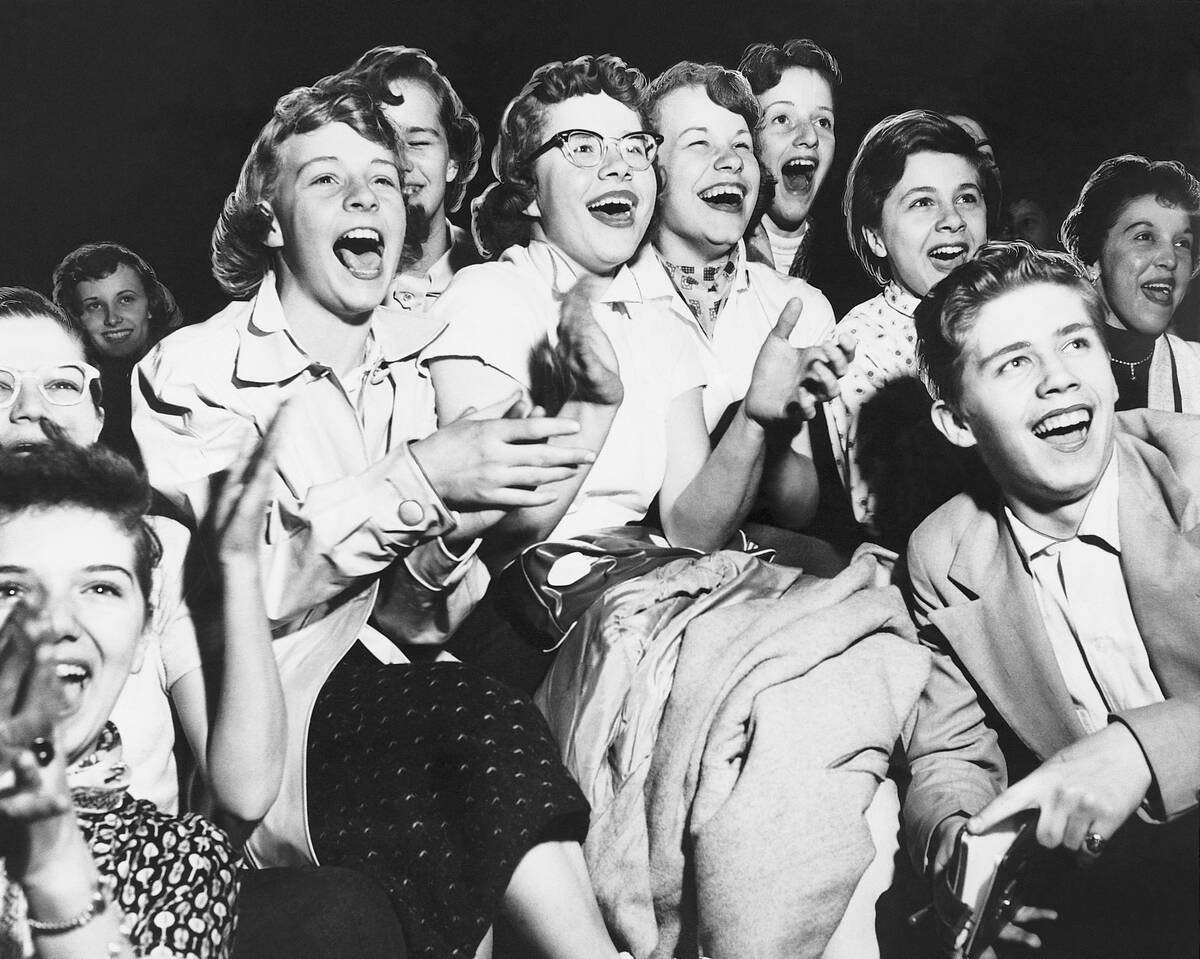 Audience Cheering at an Event