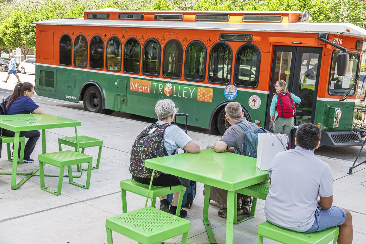 Miami, Florida, Brickell Financial District, SW 1st Avenue, The Underline, Miami Trolley free public transportation bus, elderly woman boarding