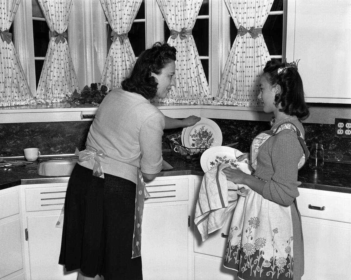 Mother and Daughter Doing Dishes