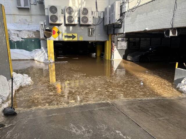 parking-garage-on-41st-and-34th-ave-flooded-v0-6ljlgalm0pgg1