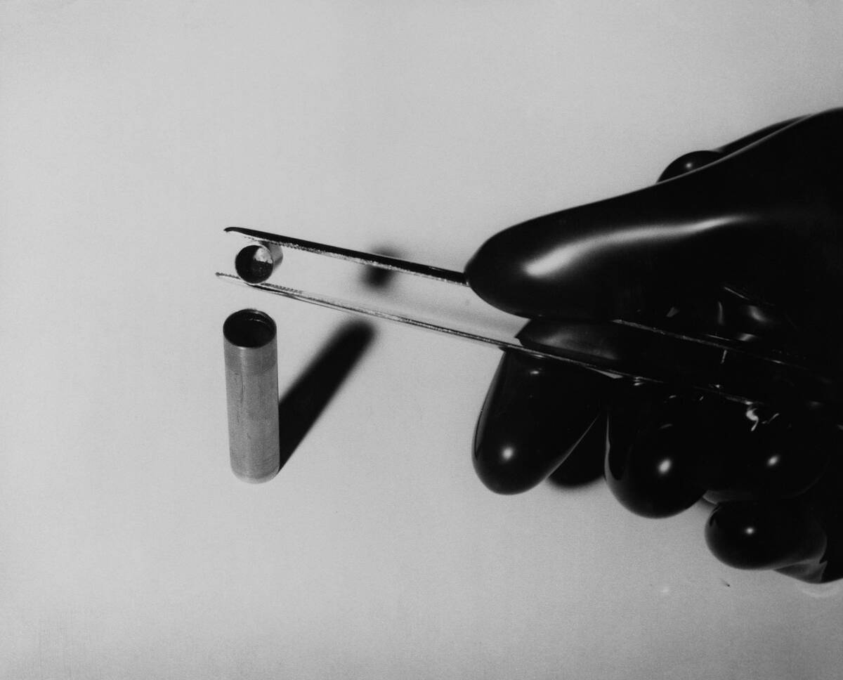 Radioactive Substance Being Poured Into a Tantalum Capsule