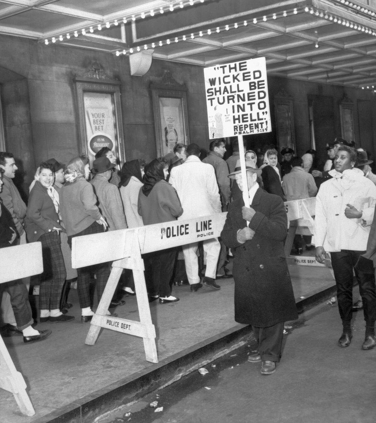 Religious Protester Holding Sign