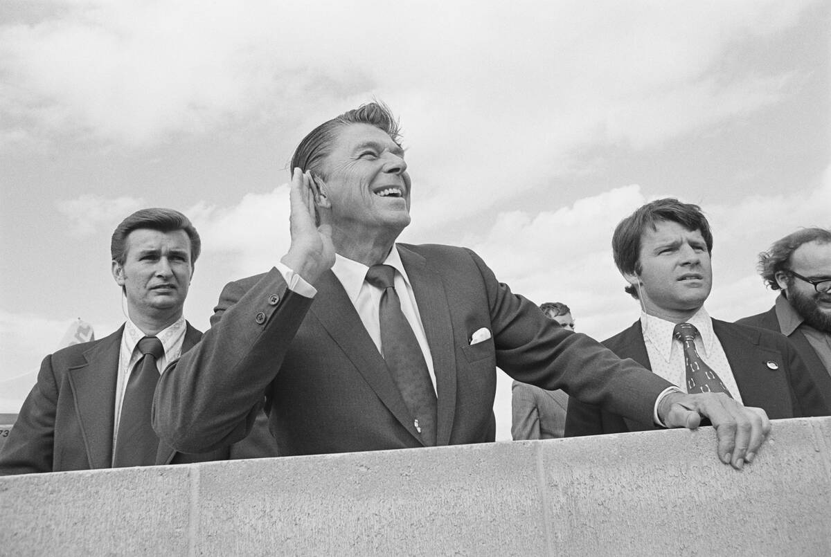 Ronald Reagan Cupping His