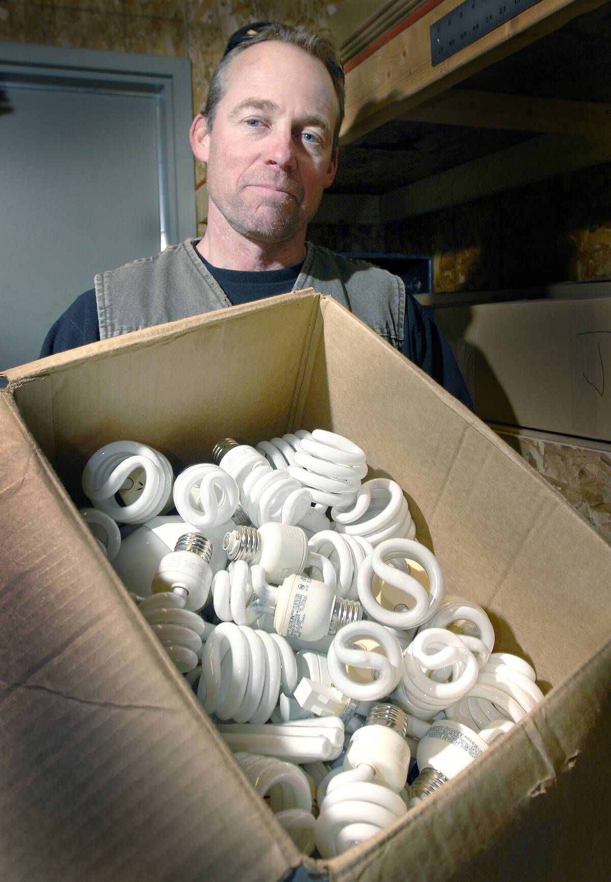 Scott McFarland, Facilities Manager at the CPRC Group, Portland's agent for recycling disposal holds...