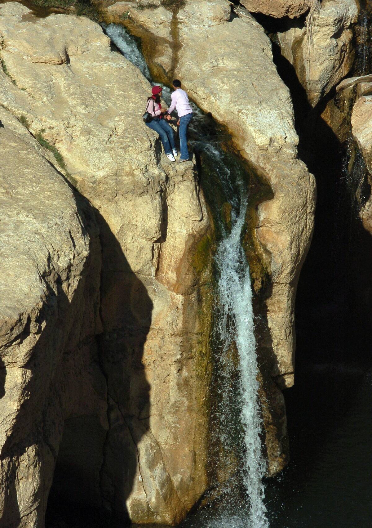 Tourists visit the water falls of Chibik
