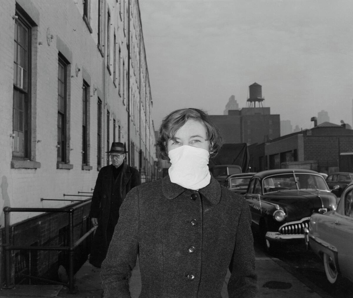 Woman Protecting Her Nose from Pungent Smell