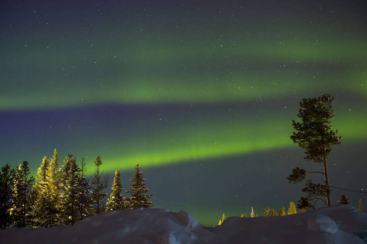 An aurora sometimes referred to as polar lights, northern...