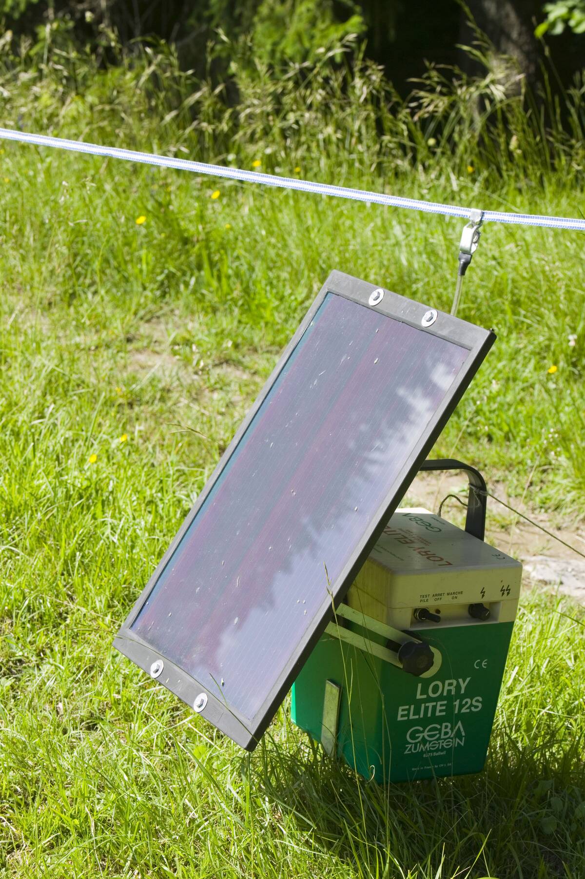 An electric fence powered by a solar panel