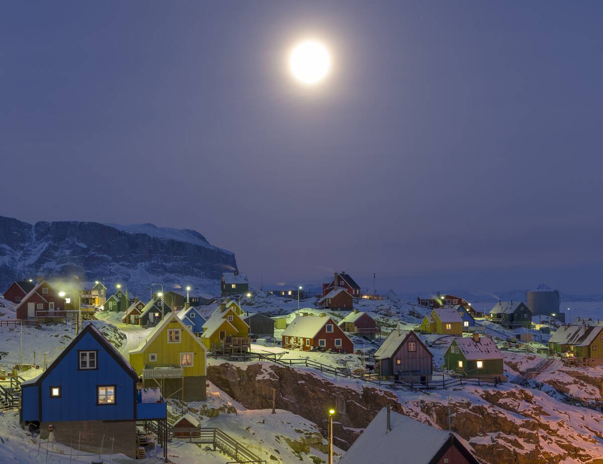 Arctic night and full moon over Uummannaq during winter in northern Westgreenland beyond the arctic circle, North America, Greenland, Danish territory