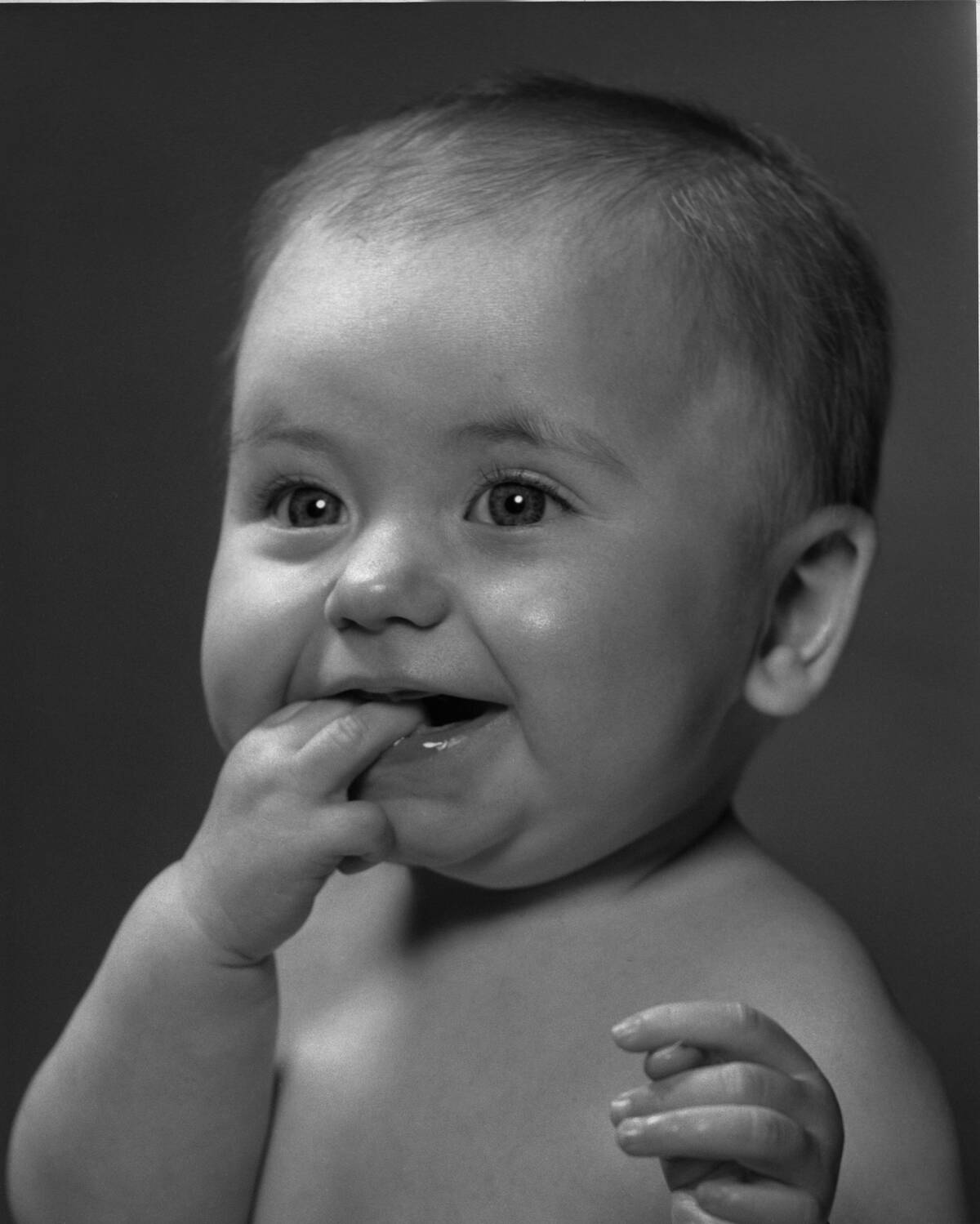 Baby Chewing On Fingers