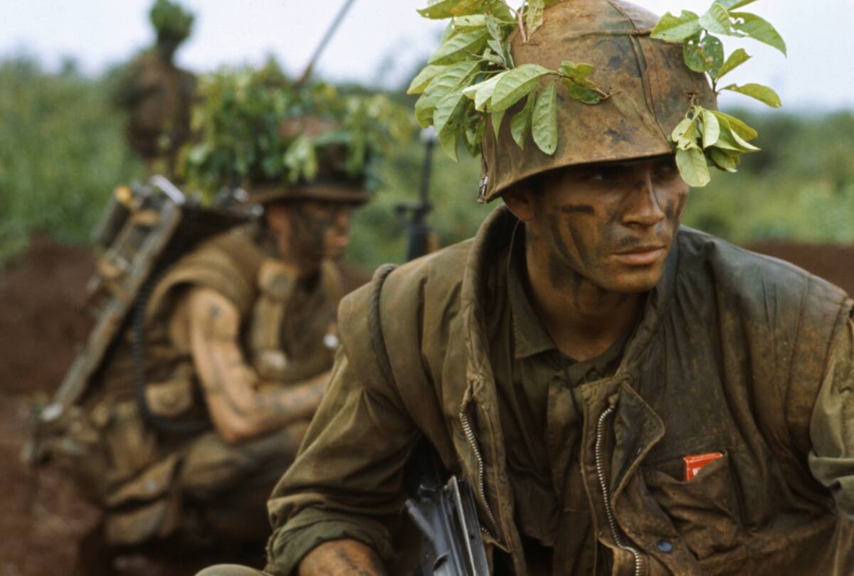 Camouflaged Marines on Reconnaissance in Vietnam
