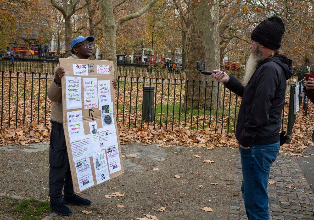 Evangelical Christian is filmed at Speaker's Corner, Hyde Park, London