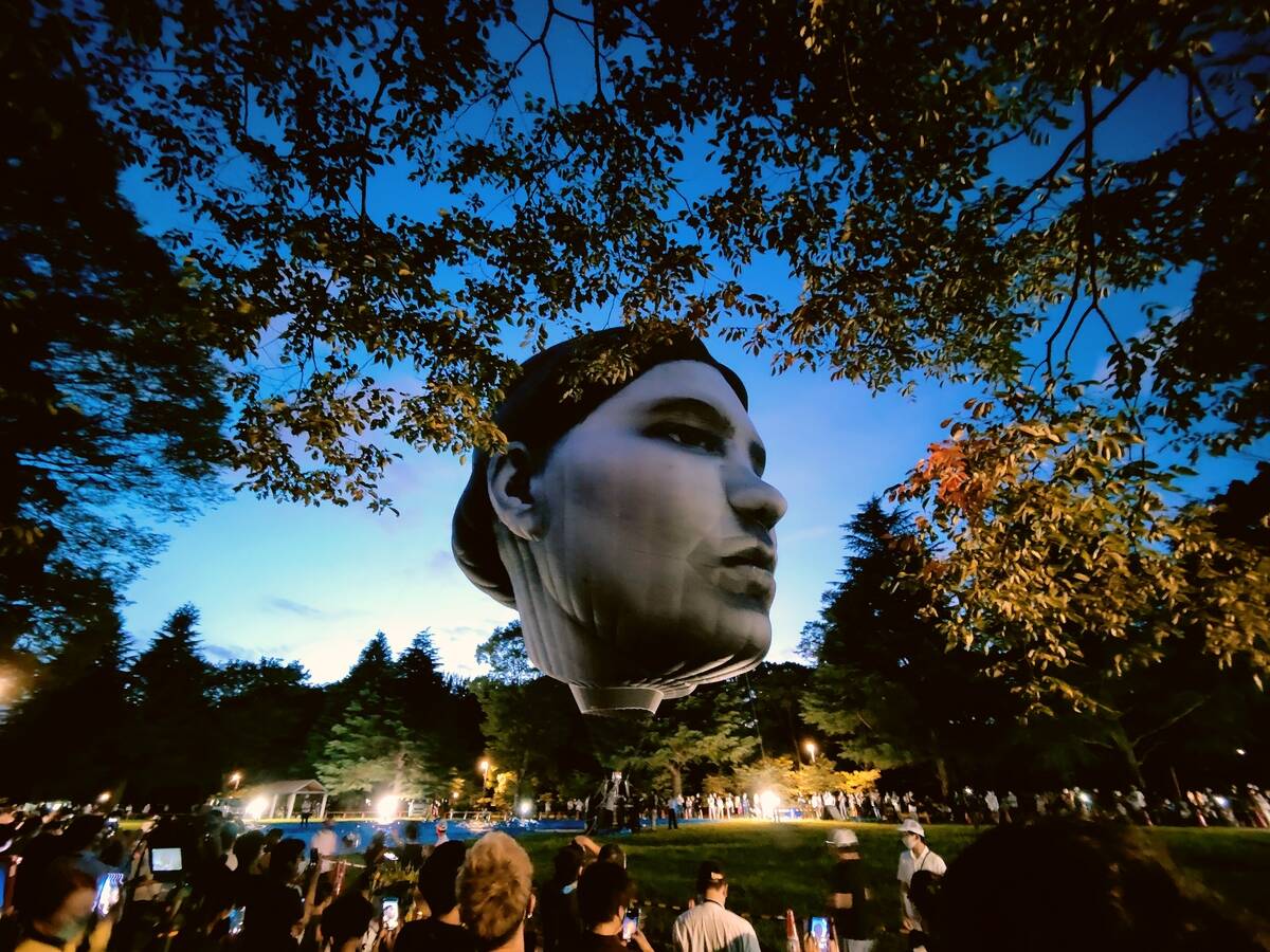 Giant Head Hot Air Balloon Floats Over Tokyo