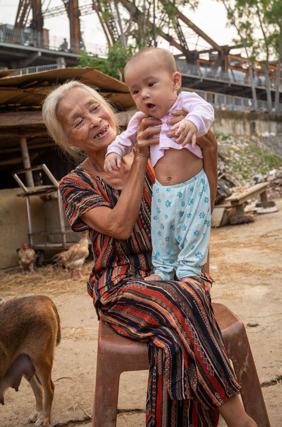 Great grandmother with great grandson, Hanoi, Vietnam