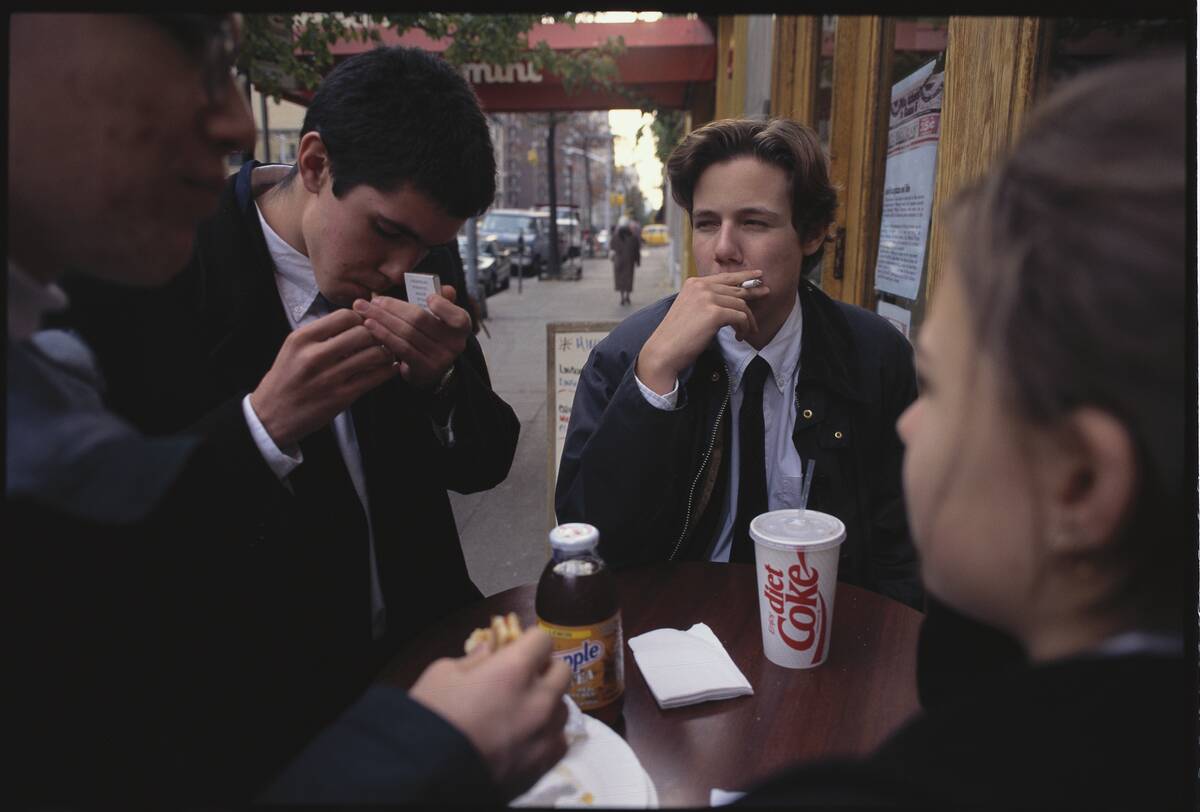 High Schoolers Smoking Outside Pizzeria
