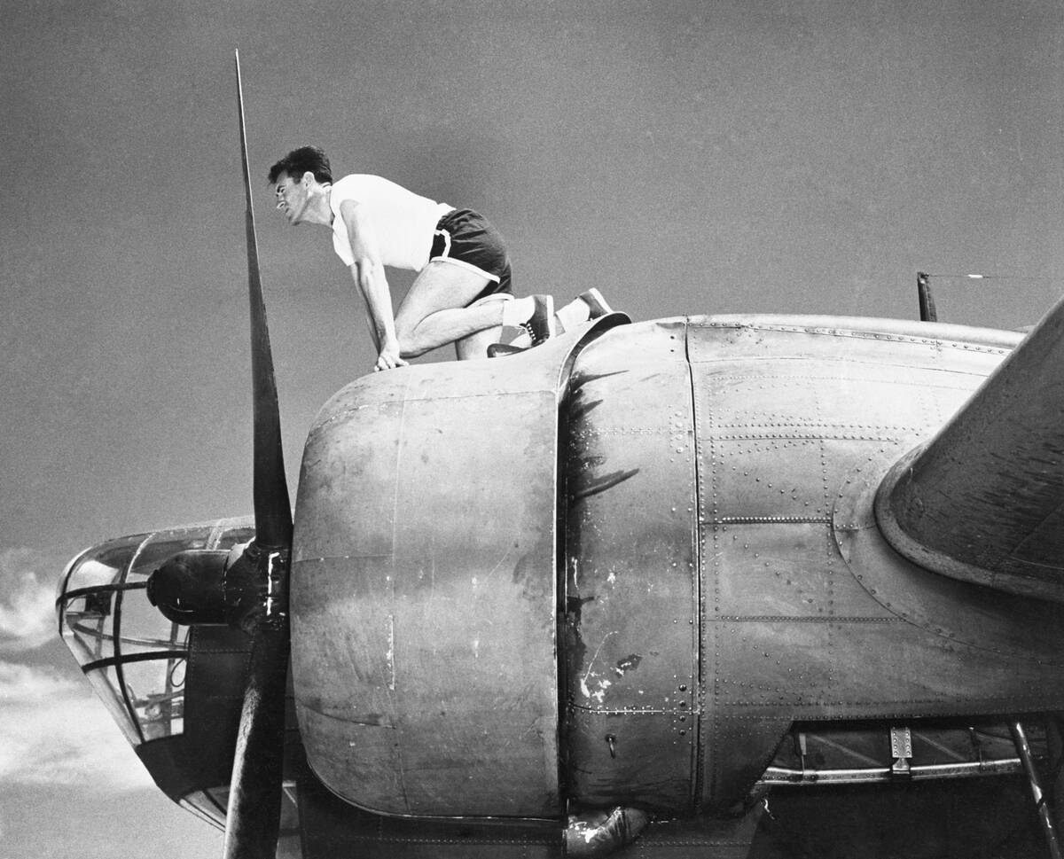 Louis Zamperini Perched on B-18 Bomber