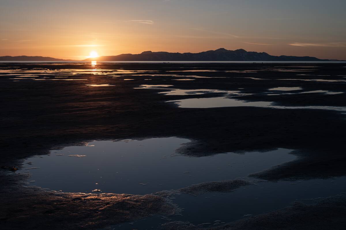 MAGNA, UT - April 6: Snow and water pool up on a stretch of exp