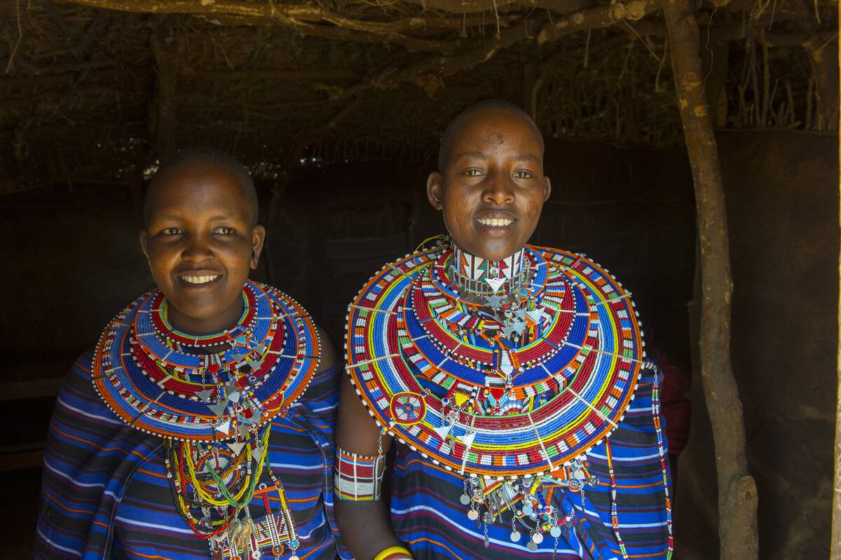 Portrait of a Masai women with glass bead jewelry in a Masai...