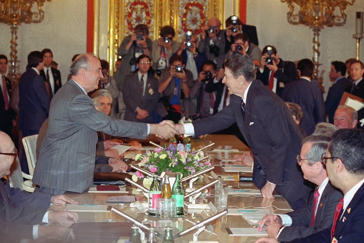 Ronald Reagan and Mikhail Gorbachev Shaking Hands