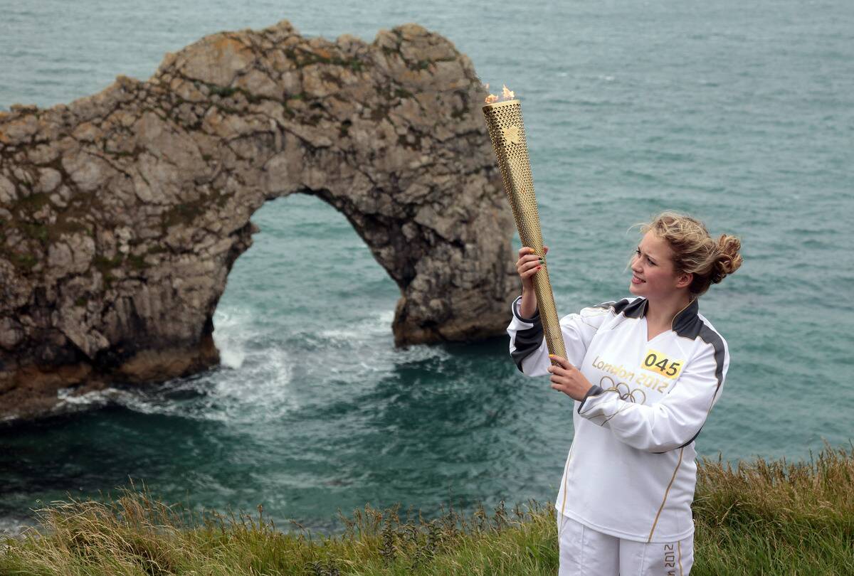 The Olympic Torch Continues Its Journey Around The UK