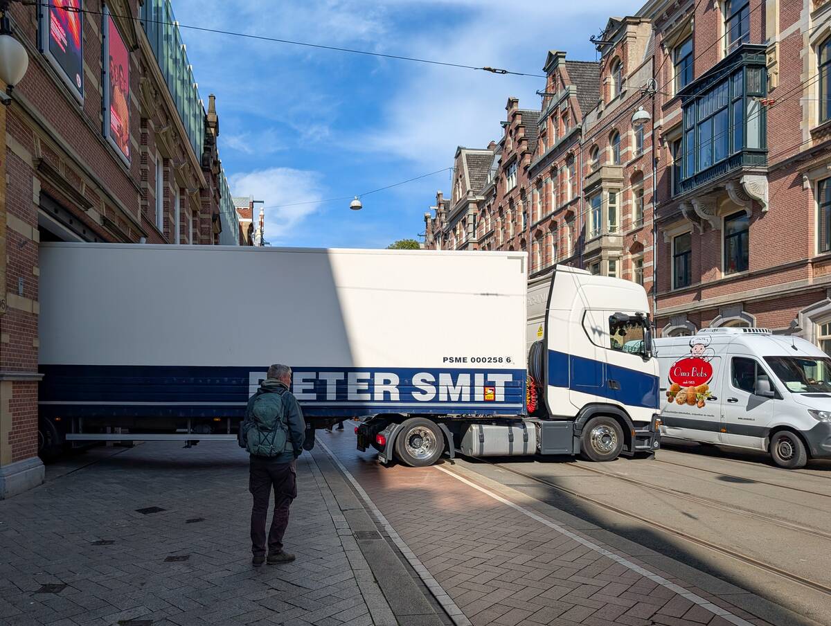 Truck Maneuvering In Narrow City Street