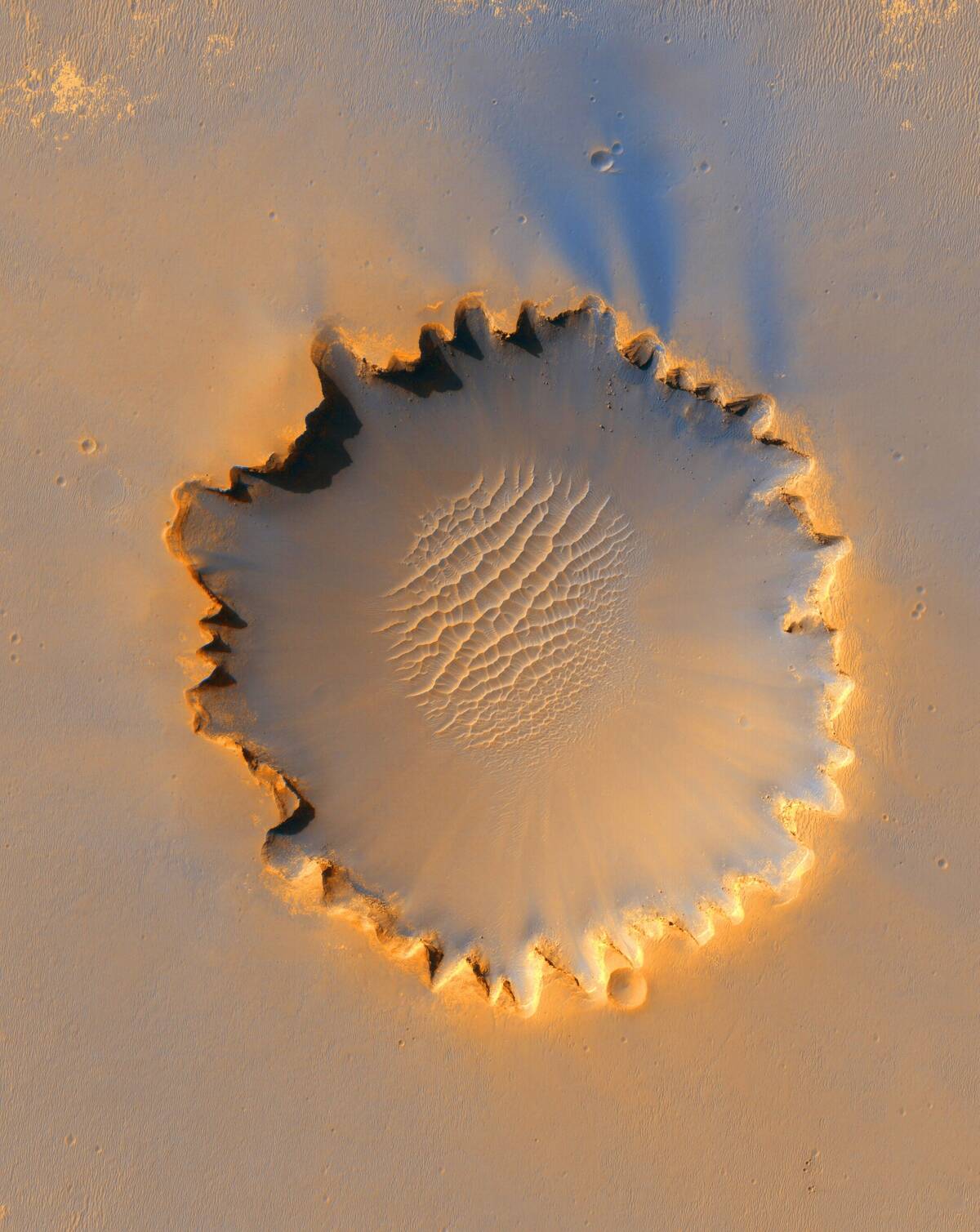 Victoria Crater, impact crater at Meridiani Planum, near equator of Mars, approximately 800 meters in diameter. 'Scalloped' rim is caused by erosion. Credit NASA. Science Astronomy Planet...